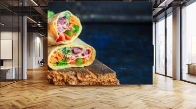 wrap tortilla or burrito stuffing vegetables vegetarian pita bread raw fish seafood in ice quick freeze Menu concept serving size. food background top view copy space for text organic healthy eating  Wall mural