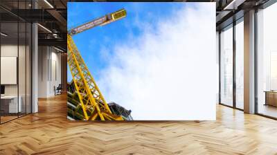 construction site and yellow crane on the background blue sky, panoramic mock-up Wall mural