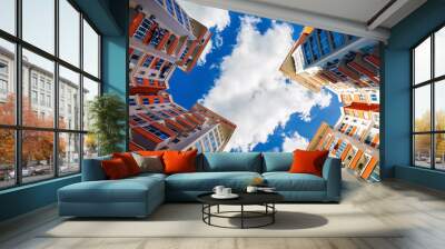 view of the building residential complexes on the background of a beautiful sky Wall mural