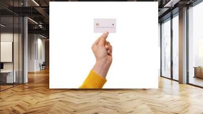 white credit card in female hand, card with electronic chip isolated on transparent background Wall mural