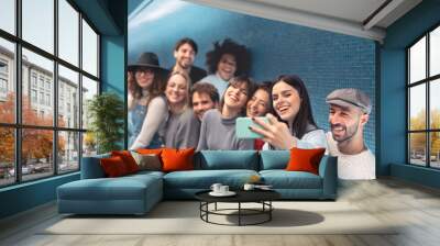 Group young friends taking selfie with mobile smartphone in subway underground metropolitan - Happy trendy people sharing time and laughing together - Youth millennial friendship lifestyle concept Wall mural