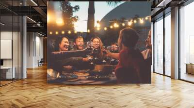 Happy family dining and tasting red wine glasses in barbecue dinner party - People with different ages and ethnicity having fun together - Youth and elderly parents and food weekend activities concept Wall mural