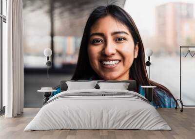 Happy native American young woman smiling in camera Wall mural