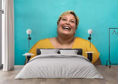 Happy plus size smiling woman portrait Wall mural