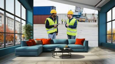 Industrial engineers working in logistic terminal of container cargo Wall mural