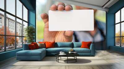 businessman holding blank business card Wall mural