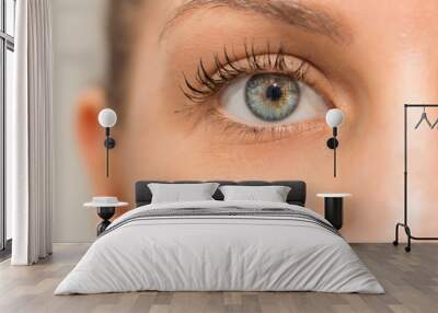 Beautiful green eye of woman Wall mural