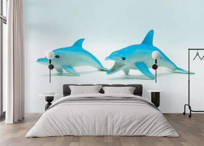 Pale blue and white Dolphins on white Wall mural