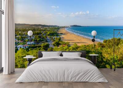 Vieste, Italy. View of Pizzomunno beach with the town of Vieste far in the background. September 9, 2022. Wall mural