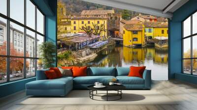 High angle view of Borghetto sul Mincio with the buildings reflecting on the water Wall mural