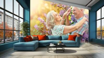  beautiful senior couple posing Wall mural