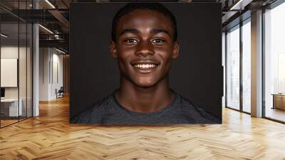 Black teenager boy on a studio background Wall mural