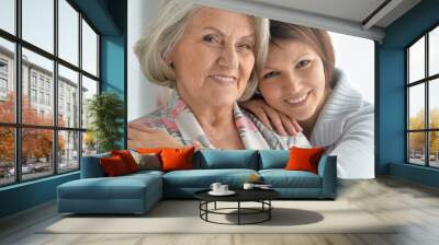 cheerful mother and adult daughter Wall mural