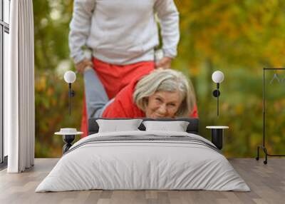 fit senior couple exercising Wall mural