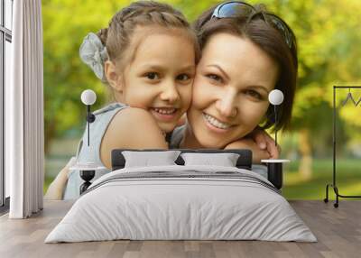 girl with mother in park Wall mural