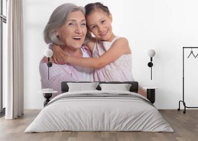 Grandmother hugging with her cute granddaughter isolated  Wall mural