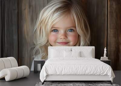 Portrait of a beautiful little girl looking at the camera Wall mural