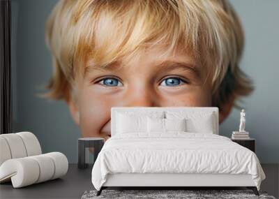 Portrait of a beautiful little smiling boy Wall mural