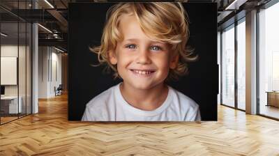 Portrait of a beautiful little smiling boy Wall mural