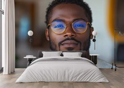 Portrait of an attractive dark-skinned man wearing glasses Wall mural