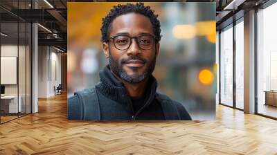 Portrait of an attractive dark-skinned man wearing glasses Wall mural