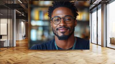 Portrait of an attractive dark-skinned man wearing glasses Wall mural