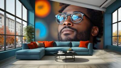 Portrait of an attractive dark-skinned man wearing glasses Wall mural