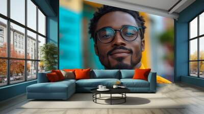 Portrait of an attractive dark-skinned man wearing glasses Wall mural