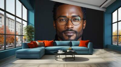 Portrait of an attractive dark-skinned man wearing glasses Wall mural