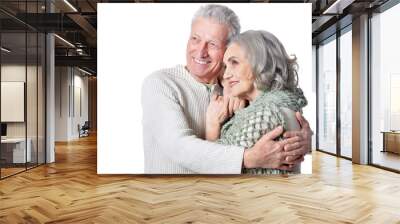 Portrait of happy senior couple posing on white background Wall mural