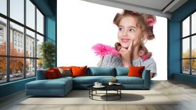 Portrait of little pretty girl with hair curlers posing with flower isolated Wall mural