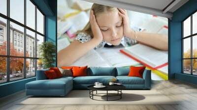 Stressed blond schoolgirl Wall mural