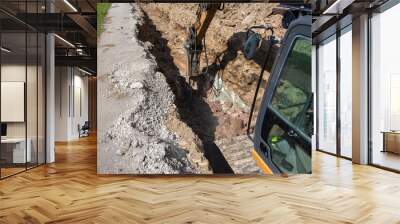 Limestone trench.. CRAWLER EXCAVATOR Works on digging the Trench . Limestone hammering Wall mural