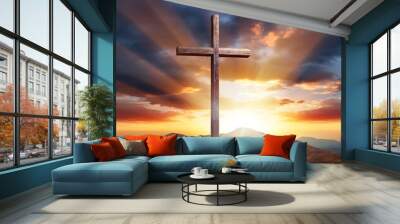 Wooden cross on the top of the mountain with sunbeams. Wall mural