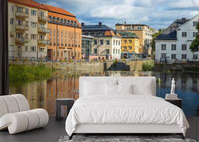 Beautiful landscape view on city from river side. Uppsala, Sweden, Europe. Beautiful backgrounds. Wall mural