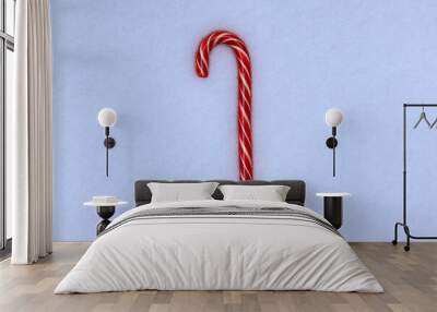 christmas red candy cane on the background of real snow Wall mural