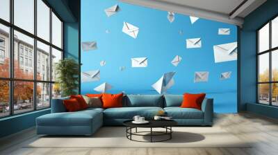 Envelope and flying paper planes on blue background Wall mural