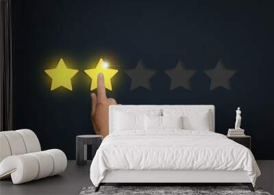 Female hand leaves a rating of two stars out of five possible ag Wall mural