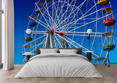 Ferris wheel on a blue background Wall mural