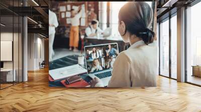 Office business team concept. Video conference call using laptop with remote working teammates Wall mural