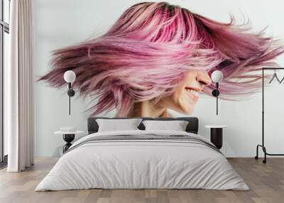 Positive and funny plus size model with white blank t-shirt and pink hear, empty grunge wall background. Shaking her colored hair Wall mural