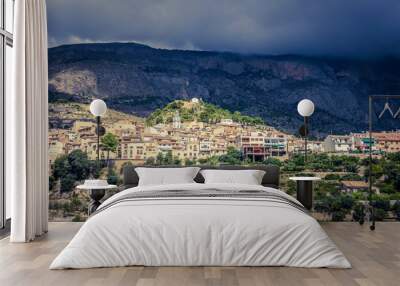 A stormy cloudy afternoon in small mountain village Sella, Costa Blanca, Alicante, 2018 Spain Wall mural