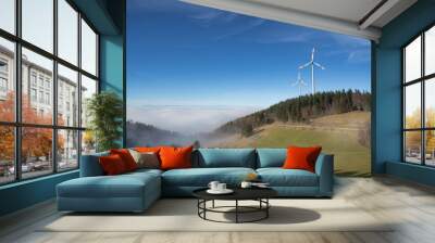 wind power mills above fog in black forest, Germany Wall mural