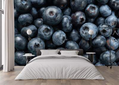 Blueberry background. Texture of fresh blueberries close-up. Sprinkle blueberries. Ripe blueberries with copy space. Scattered fresh blueberries Wall mural