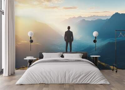 Reaching New Heights: A Businessman's Triumph at the Mountain Peak Wall mural