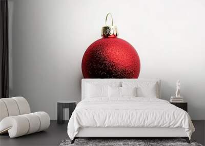 Red Christmas ornament centered on white background Wall mural