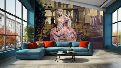 victorian lady. young woman in eighteenth century image posing in vintage interior Wall mural