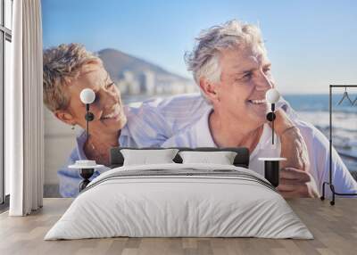 Hug, happy and mature couple at beach, holiday and bonding in vacation for fresh air, smile or nature. Embrace, old man and woman for romance in Australia, travel and date in ocean, view and weekend Wall mural