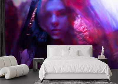 spoils through the multi-colored film of the girl. girl with captivity colored iridescent Wall mural