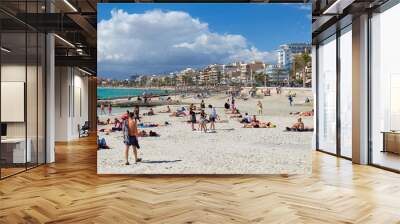 People sunbathing on the beach of El Arenal resort town,  Majorca, Baleares, Spain Wall mural